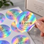 Holographic stickers - Bloom Skincare design on a sticker sheet
